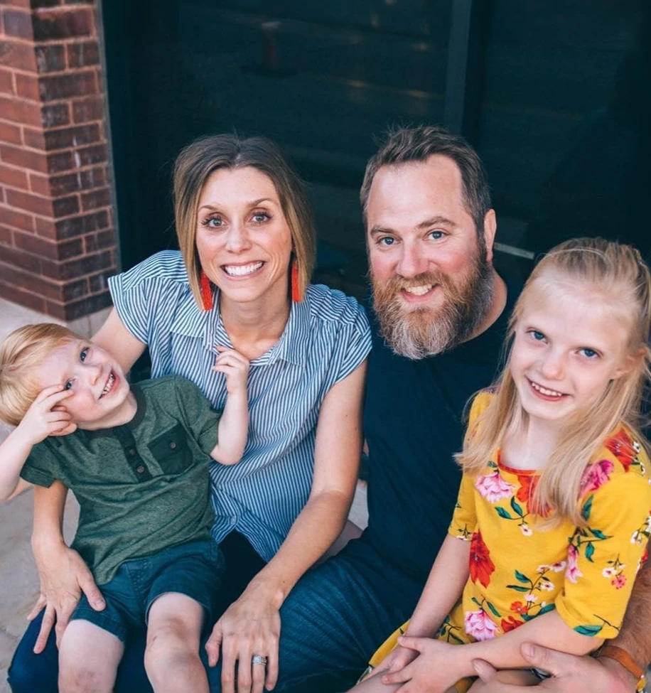 Cale and Jamie Henderson with their family